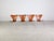 Four of a total of 31 original Fritz Hansen Series 7 (Model 3107) chairs. These stackable chairs were designed by Arne...