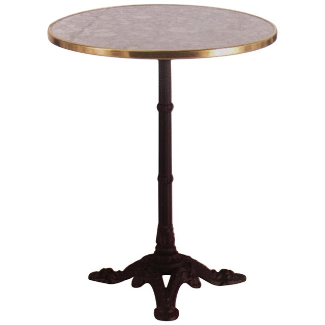 French style cast iron base with marble & brass top garden table or bistro table. The base it's black but you can choose...