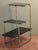 The B136 etagere or flower stand, manufactured by Thonet, was designed by A. Guyot for the 1930/31 Thonet catalog. Black...