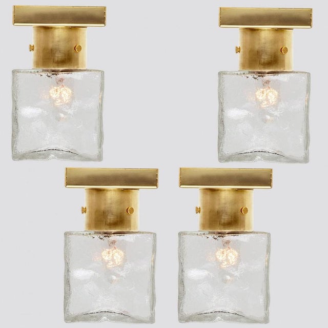One of the eight small light fixtures by j.t. Kalmar, vienna, austria, manufactured in circa 1960. Each square wall light...