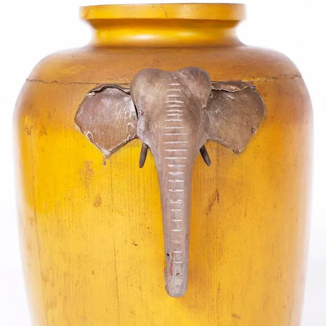 Antique Japanese Meiji period wood vase or vessel with striking aged yellow paint and decorated with carved wood elephant...