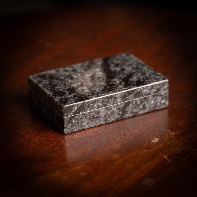 Vintage 20th Century Italian stone box crafted from black and Blue Ice granite (Blu Ghiaccio). The contrasting tones of...