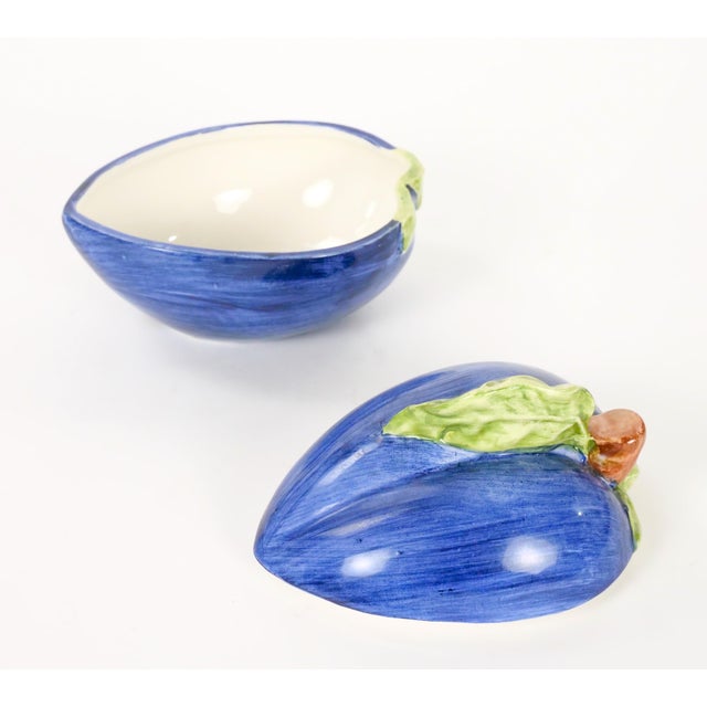 A charming late 20th-century Italian majolica covered table ornament modeled in the form of a ripe plum. The piece is...