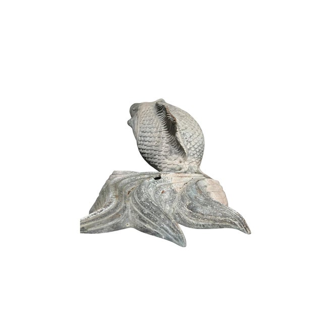 Sculptural koi fish fountain executed in solid copper with naturally developed verdigris patina. The form features a...
