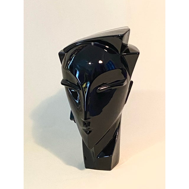 Ceramic head sculpture with shiny black glaze in the Art Deco style. Likely by / or in the style of the artist Lindsey B....