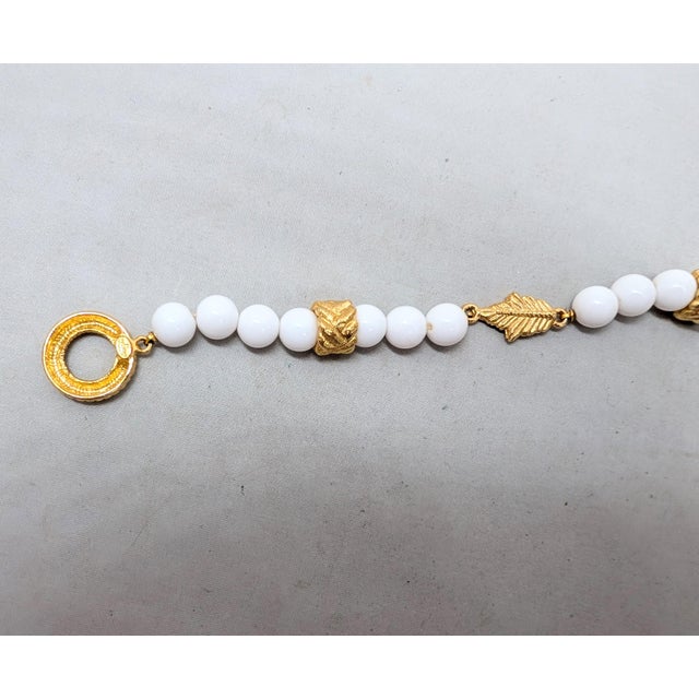 White Vintage 1980s Signed Givenchy Goldtone & White Resin Leaf Toggle Bracelet For Sale - Image 8 of 8