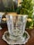 Elegant Fabergé crystal champagne or ice bucket featuring a beautifully cut crystal body accented with gilt bronze trim...