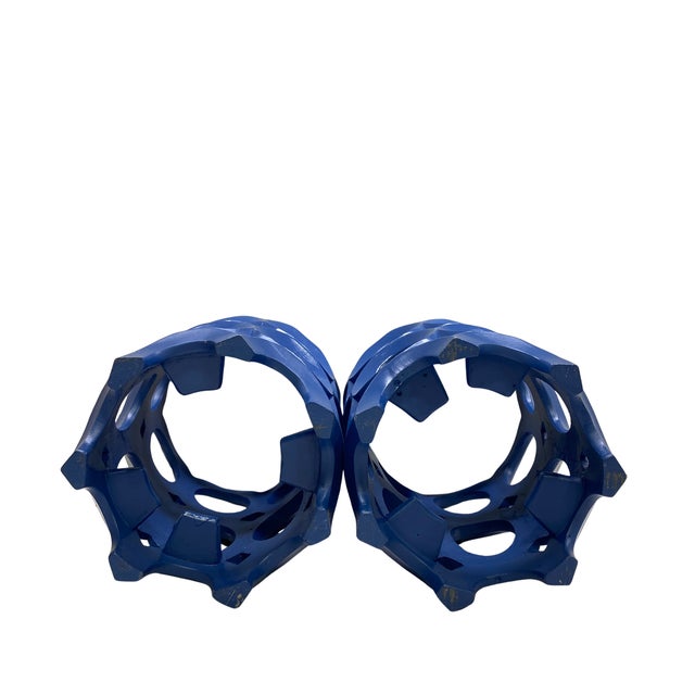 Striking pair of vintage sculptural candle holders crafted from wood and finished in a rich cobalt blue lacquer. Each...