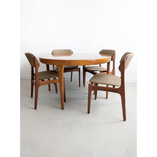 Speaking of Scandinavian aesthetic! This extendable dining table truly is a textbook example, featuring the typical (and...