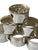 A refined set of twelve vintage silver-plated napkin rings, dating to the 1950s, each engraved with an elegant “S”...