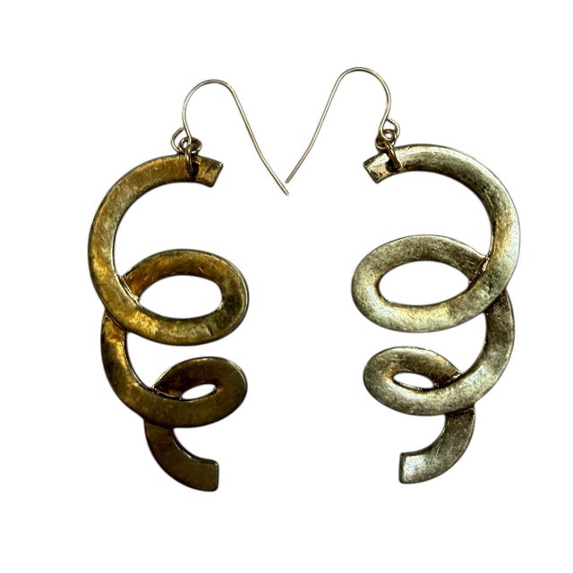 Snake style dangle earrings in brass with original patina circa 1980’s.