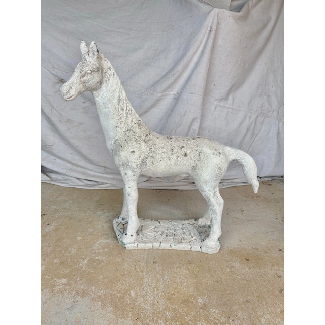 Found in the South of France, this 20th Century French Horse Garden Statue was crafted from concrete in the 1900's. This...