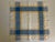 Set of six mid-20th century l woven linen napkins, executed in a blue and mustard plaid with integrated jacquard damask...