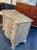 The 19th Century Swedish Gustavian Grey Chest is a beautifully crafted piece of furniture with a classic gray color and...