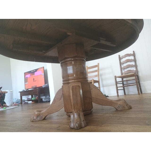 Brown Antique Round Oak Pedestal Dining Table With Claw Feet Dating From the Late 19th to Early 20th Century. For Sale - Image 8 of 14