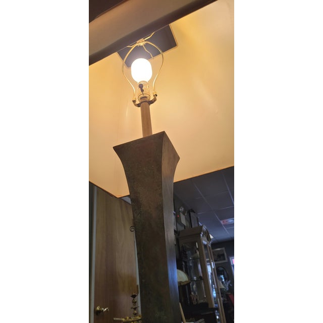 A bronze modern floor lamp after the original design by Stewart Ross James for Hansen Lighting. Dating to the 1980s....