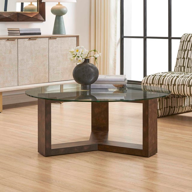 The Stunning Ignis Coffee Table Features A Round Tempered Glass Tabletop That Allows The Rich, Intricate Patterns Of The...