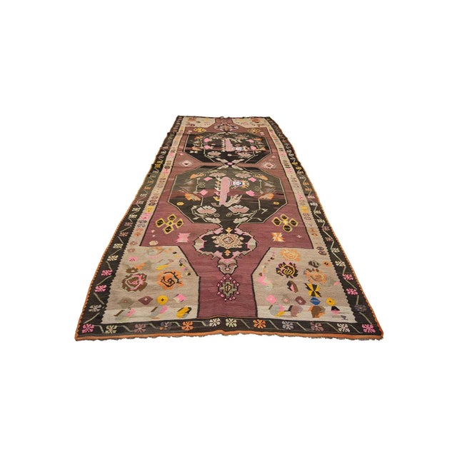 Handwoven vintage kilim rug from Kars region of Turkey. Approximately 50-60 years old. In very good condition.