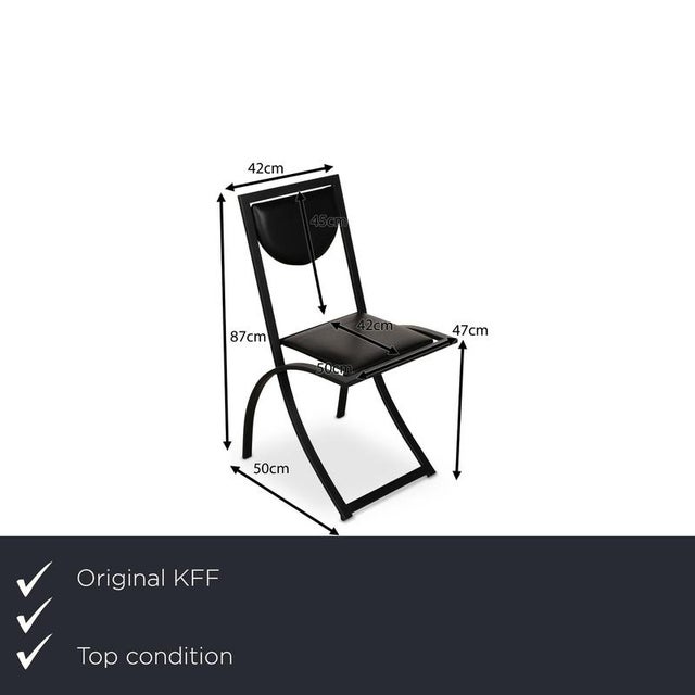 The Sinus chair set from KFF consists of a total of four chairs with a metal frame and a seat covered in black genuine...