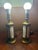 This vintage pair of French Empire brass and milk glass table lamps exudes elegance and charm, perfect for any space...