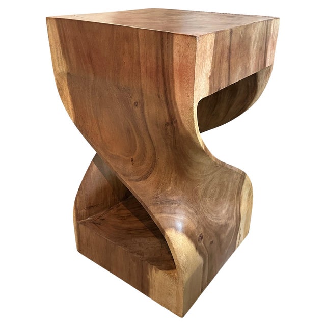 Impressive reclaimed suar wood pedestal. Hand carved into this stunning shape from a single block of wood. Finished with a...