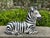 Italian glazed terracotta zebra sculpture. Offered is a lovely Italian Hollywood Regency black and white glazed terracotta...