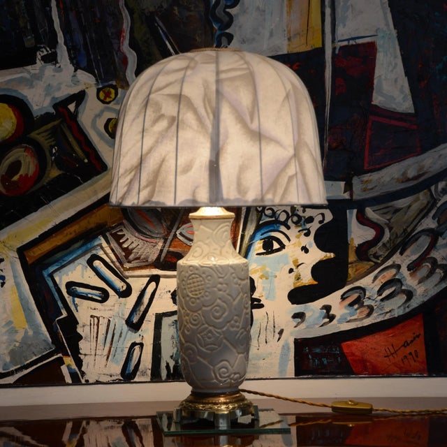 The original Art Deco lamp base has a lampshade from a more recent date (which could be replaced to suit your own taste)....