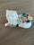 Adorable Las Vegas souvenir from the 1960s-70s. This cute white cat has a pin cushion surrounded by porcelain flowers.