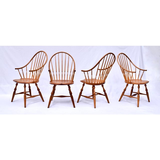 Bespoke set of six continuous arm Windsor chairs of solid Cherry by Kinloch Woodworking Ltd; Unionville, Pennsylvania. So...