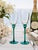 Elevate your next celebration with this elegant pair of vintage tall champagne flutes by the Libbey Glass Company....