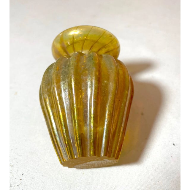 Up for sale is a high quality hand blown miniature glass vase by Stephen Fellerman in 1991. It's blown into a gorgeous...