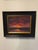 This oil on panel artwork captures the serene beauty of twilight over a mountain lake, where vibrant hues of deep purple...