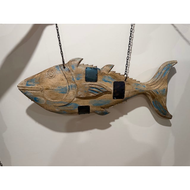 Make a massive coastal statement with this heavily textured, hand-carved wooden fish sculpture. Spanning nearly three feet...
