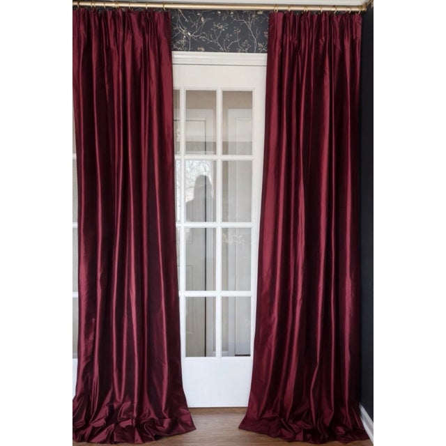 Custom designed merlot silk drapery panels with a beautiful iridescent sheen and substantial workroom construction. The...