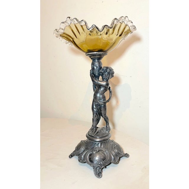 Up for sale is a high quality antique ornate silverplate and hand blown glass centerpiece tazza. The shaft features a...