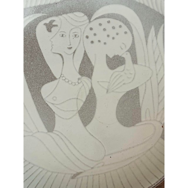 A large 1950's Swedish ceramic platter by Anna-Lisa Thomson (1905-1952) for Upsala-Ekeby (UE). The earthenware platter...