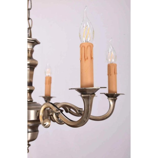 Very high quality chandelier from the 1950s. The chandelier is in perfect, completely restored condition - new electrical...