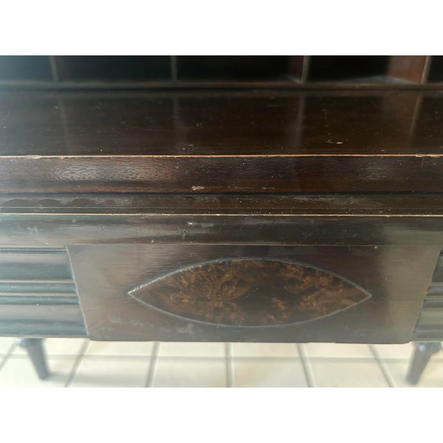 Beautiful antique American mahogany spinet writing desk dating to approximately the 1920s. Designed to resemble a small...