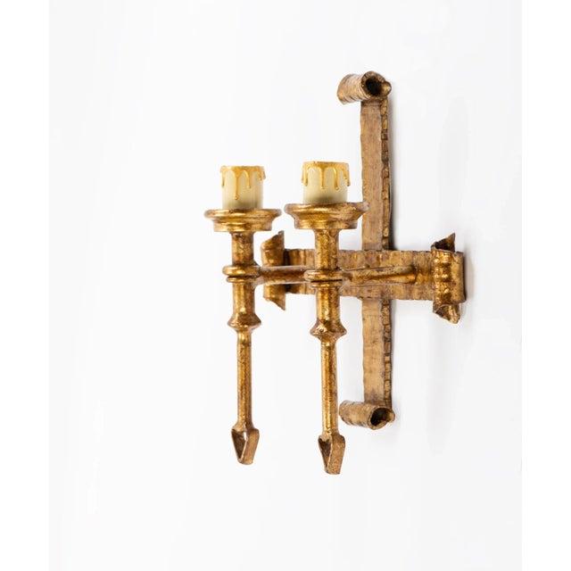 Vintage Spanish gilt iron two light gothic style wall sconce, circa 1950s, has been fully rewired and is now ready to be...