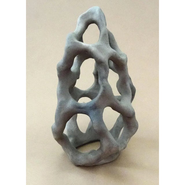 Infinity loops. Stone mass h 18,5 cm Small gray color abstract sculpture "Infinity loops" from stone mass I have official...