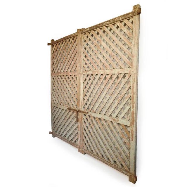 Large vintage lattice double door or gate from North India. Beautiful teak wood original patina of sage green and sliding...
