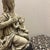 This beautiful vintage statue depicts the Virgin Mary cradling the Christ Child, a pose famously captured in...