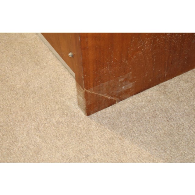 Mid-century modern sideboard by Founders with drawer and cabinet storage. Great for home or office use. Warm teak wood...