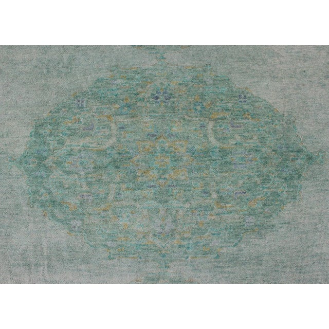 Modern Oushak Rug With Floral Medallion Design in Various Shades of Green 6'7" X 9'2" For Sale - Image 9 of 11