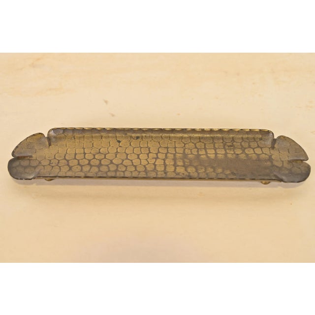 A gorgeous Arts & Crafts period brass finished hand hammered copper pen tray By Roycroft (signed with impressed orb and...