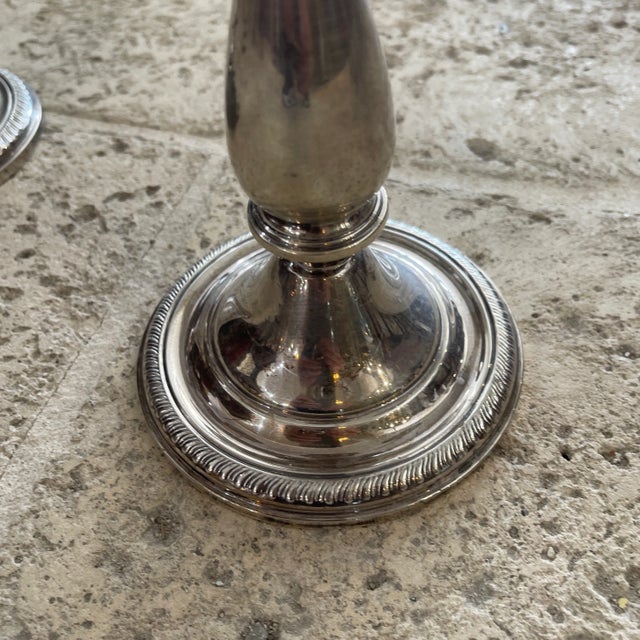 New York Three Light Candelabras with three curved and twisted arms. Stamped "Sterling Reinforced with Cement 263". Weight...