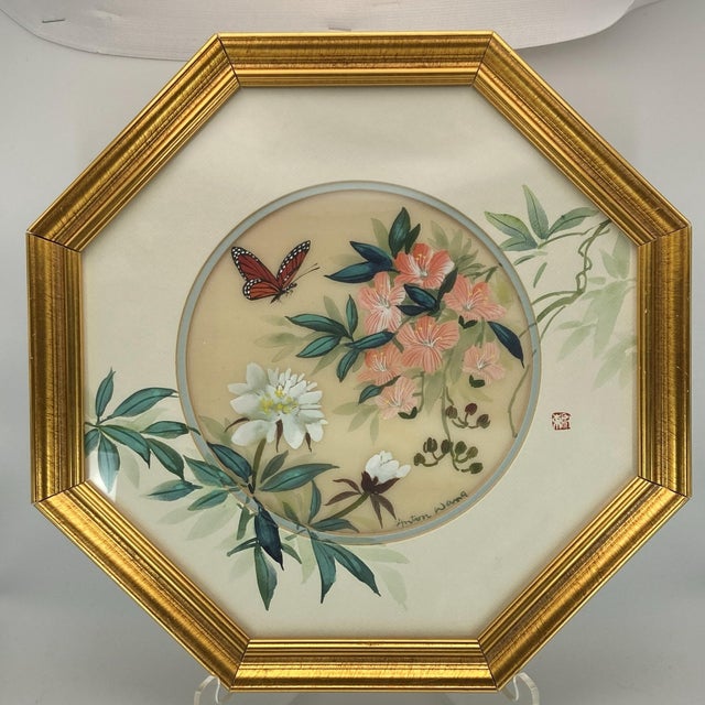 Beautiful matched set of 2 vintage watercolor on silk paintings by Anton Wang. The paintings feature bright butterflies...