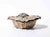 Elegant circular silver-plated vanity or trinket box of restrained classical design, featuring a fitted lid with delicate...