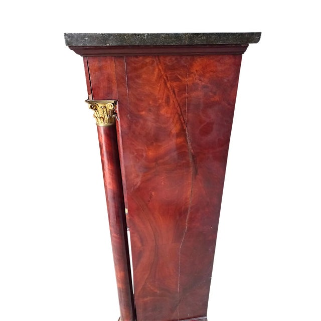 Empire writing desk in flamed mahogany and chased mercury-gilt bronze. Slit flap, doors, and sides (visible in photos) Oak...