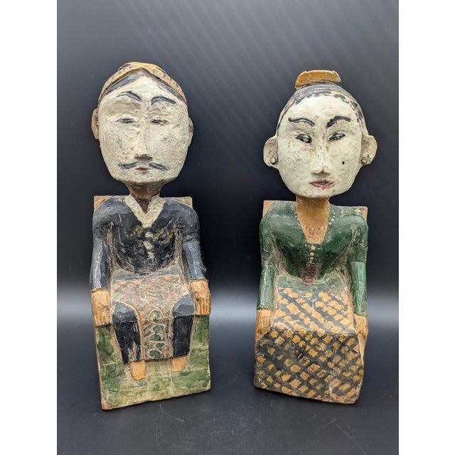 Traveling Man Treasures is selling this antique pair of "Loro Blonyo" statues: traditional Javanese folk art sculptures...